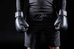 cropped-shot-of-boxer-in-black-gloves-isolated-on-2022-12-16-21-19-16-utc (1)